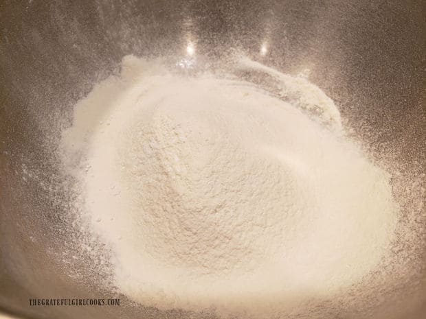 Flour, baking powder and salt are sifted together for the brownie batter.