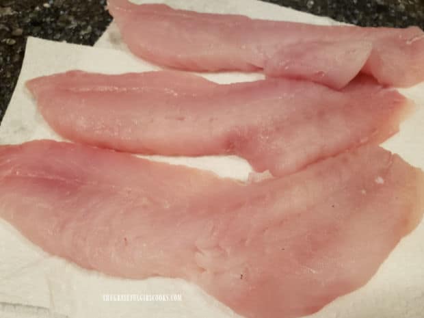 Paper towels are used to dry the rockfish before covering with coating.