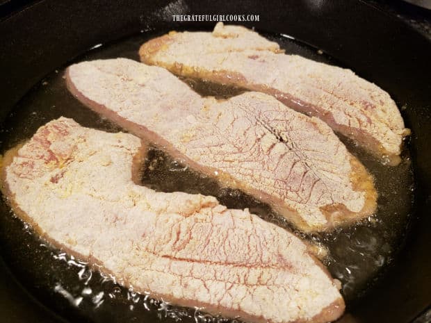 The Krispy rockfish fillets are fried in hot oil for 6-7 minutes before flipping to other side.