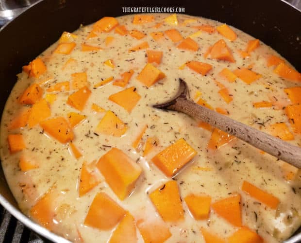 The butternut squash coconut curry is cooked until the squash becomes tender.