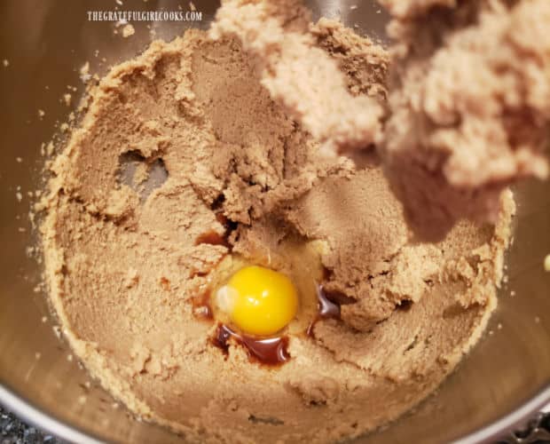 An egg, plus vanilla and almond extracts are added to the cookie batter.
