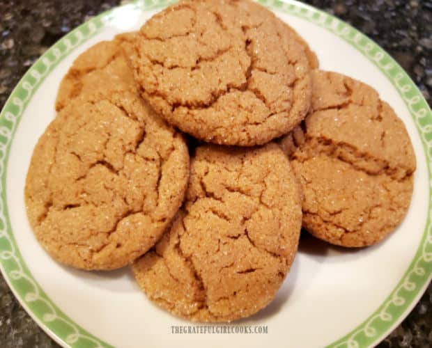 A pile of the cinnamon crinkle cookies on a plate, ready to enjoy!