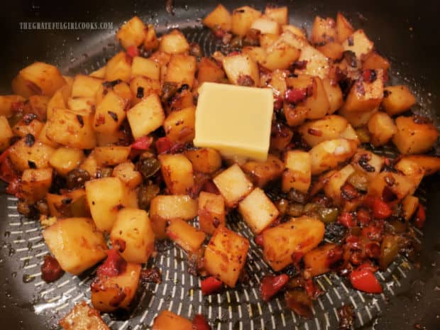 Butter and additional olive oil is added to the country skillet potatoes to help them get crispy.