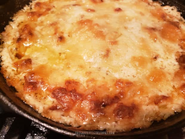 Hot Guinness Baked Cheese Dip cools on wire rack after baking.