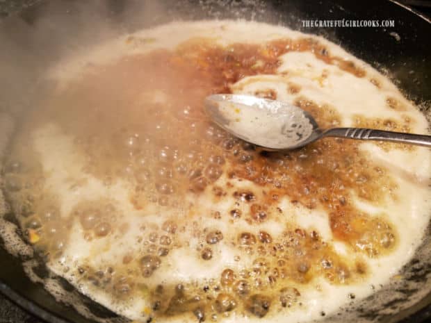 The browned butter orange pistachio sauce is ready to drizzle on asparagus.