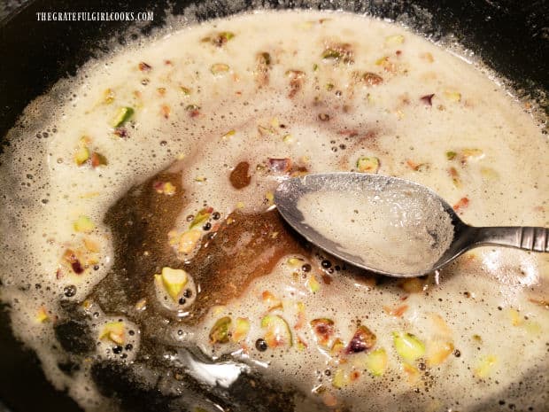 As butter begins to brown, the orange pistachio sauce comes together.