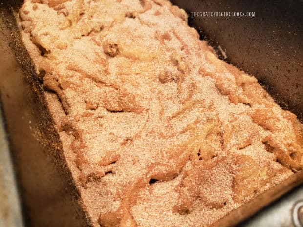 Each of the loaves is topped with cinnamon sugar mixture before baking.