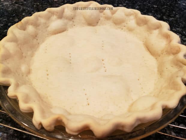 Pie shell is baked before making pie filling, and is allowed to cool before filling.