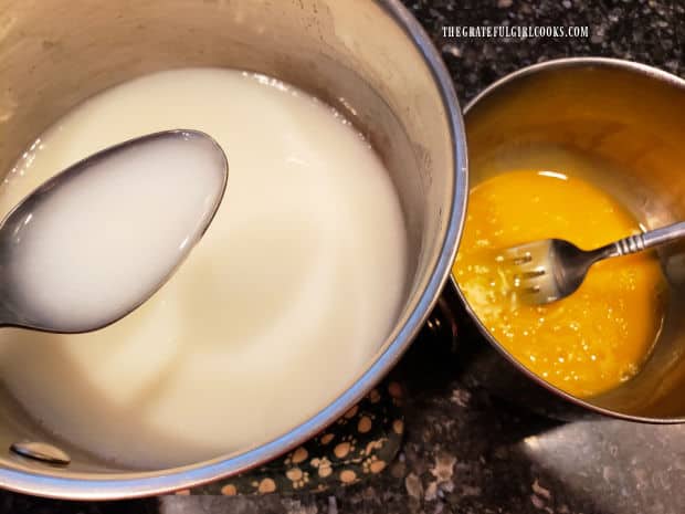 A small amount of milk mixture is used to temper egg yolks so they don't get scrambled.
