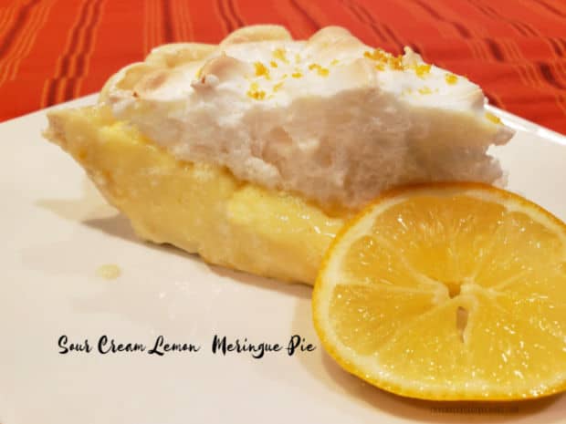 Sour Cream Lemon Meringue Pie, filled with creamy sweet/tart lemon filling and topped with puffy meringue, is a fabulous dessert you'll love!
