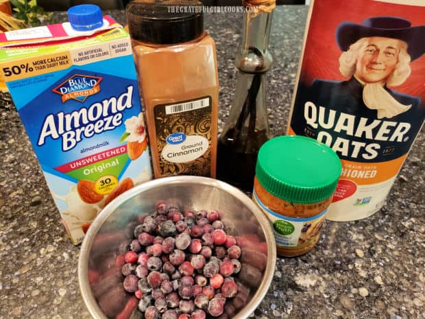 Oats, cinnamon, vanilla, almond butter, milk and frozen or fresh blueberries are used in the recipe.