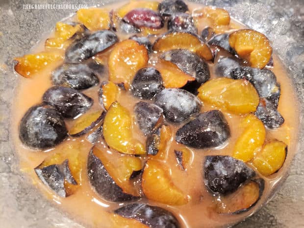 After being refrigerated overnight, the plum mixture is ready to be cooked into jam.