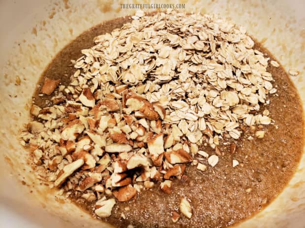 Butter, brown sugar, milk, pecans and old fashioned oats are added to egg mixture.