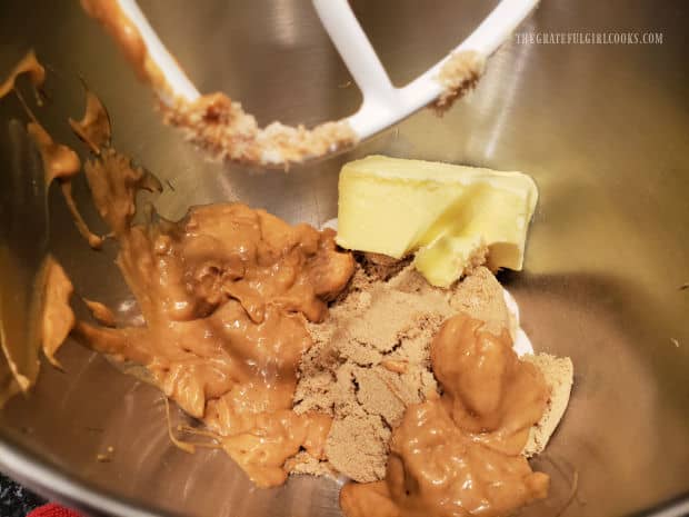 Peanut butter, brown & granulated sugar, and butter are combined using a mixer.