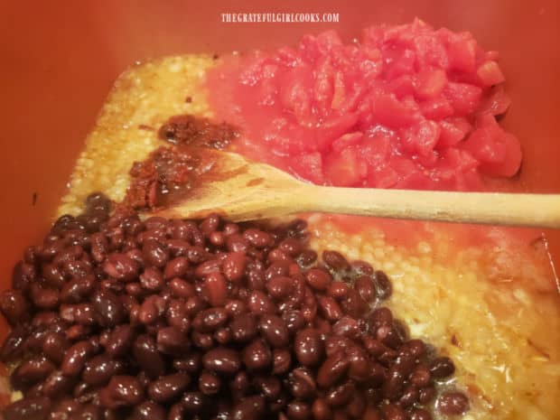 Chipotle pepper, black beans and diced tomatoes are added to the easy black bean stew.