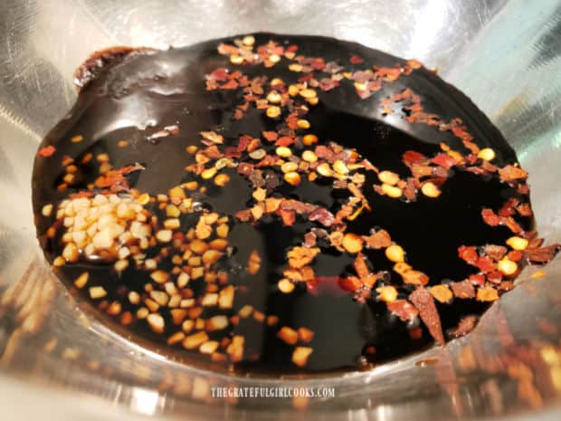 Ingredients for the Asian-style marinade are placed in a small bowl.