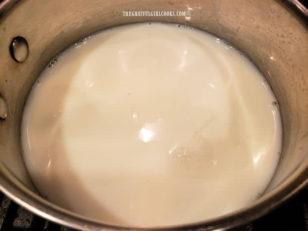 Milk and salt are added to the pan of soaked tapioca pearls.
