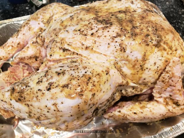 The seasoned whole turkey is now ready to go on a pellet grill or into a smoker.