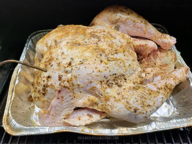 Temperature probe is inserted into thickest part of the turkey before cooking.