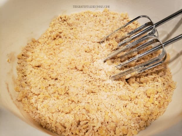 Dough for the bread is crumbly after the eggs are beaten in.