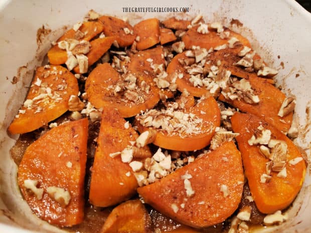 Chopped pecans and cinnamon is added to the top of the dish when halfway done baking.