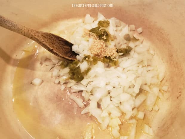 Chopped onion, jalapeno and minced garlic are lightly browned in olive oil in soup pot.