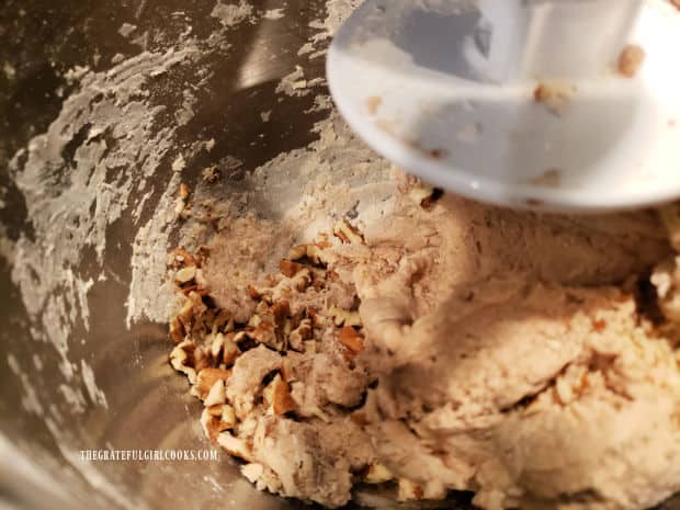 Halfway through the mixing time, chopped pecans (or walnuts) are added to bagel dough.