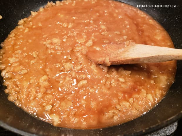 Butter and granulated sugar begin to turn amber in color and liquefy as it cooks.