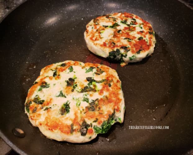 When the bottom of the turkey burgers is browned, they are flipped over to cook other side.