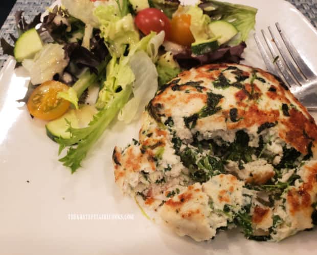 One of the turkey, feta and spinach burgers served with green salad on the side.