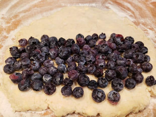 Frozen blueberries are added to half of the biscuit dough.