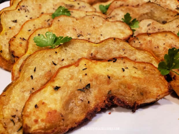 Roasted Parmesan acorn squash is served hot, and is very tender to the bite