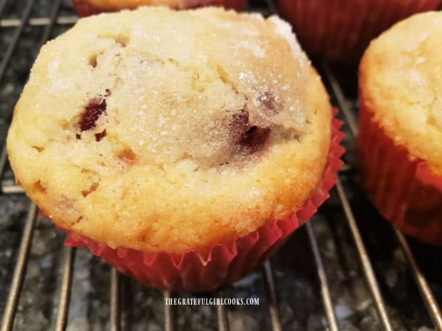 A close up reveals a bit of the surprise raspberry filling peeking out from the muffin.