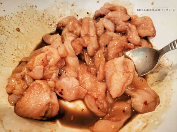Chicken breast chunks are marinated in an Asian-inspired sauce before pan-searing.