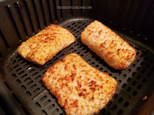 Halfway through the air frying time, the fillets are flipped to cook the other side.