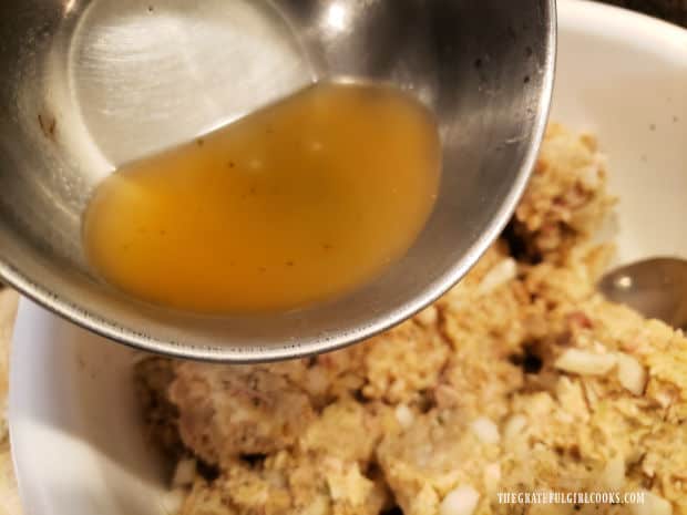 A small amount of turkey or chicken stock is added to help bind the turkey mixture together.