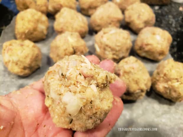 Heaping Tablespoons of turkey mixture is shaped into round balls.