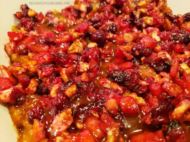 The cranberry caramel apple yams are baked for 15 minutes to fully heat them through.