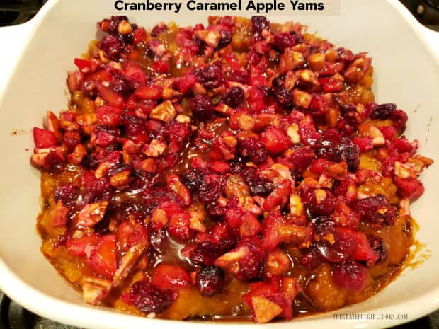 Baked Cranberry Caramel Apple Yams are amazing! Canned yams are mashed, topped with cranberries, apples & pecans, then drizzled with caramel.