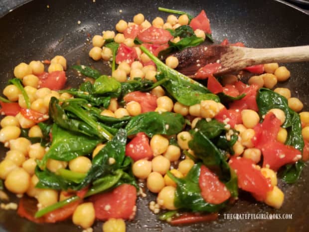 Once the spinach leaves have wilted from the heat, the garlic and veggie sauce is done.