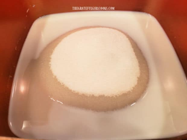 Granulated sugar and milk are combined and cooked in a large saucepan.