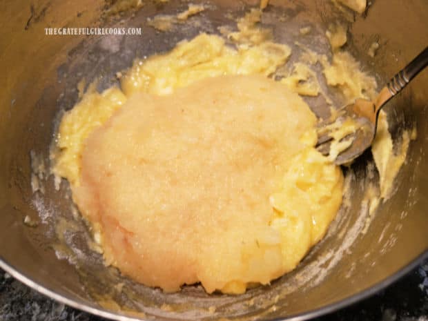 A well-drained 8 ounce can of crushed pineapple is added to the topping mixture.