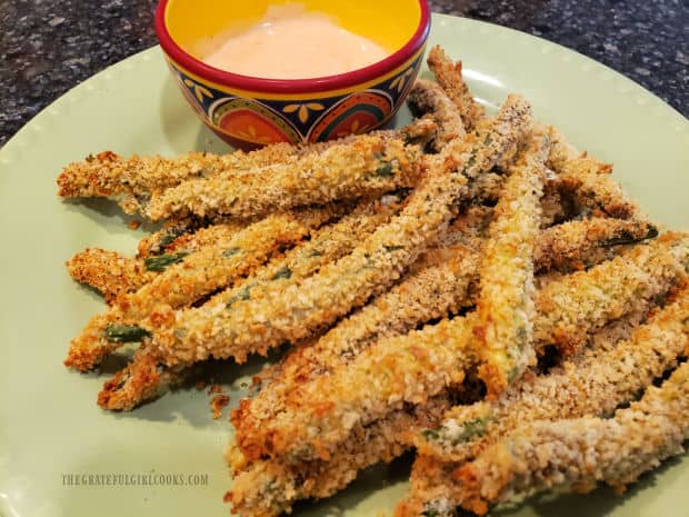 A Ranch and Sriracha dipping sauce is served along with the crispy green bean fries.