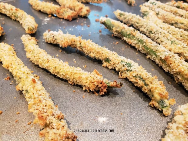 Crispy green bean fries are golden brown once baked.