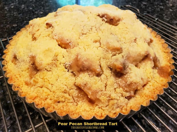 Pear Pecan Shortbread Tart is a yummy dessert with a shortbread crust and pear, cinnamon, brown sugar filling, topped with buttery streusel.