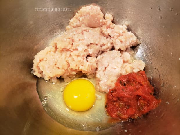 Ground chicken is combined with an egg, and some chunky salsa.