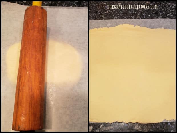 Plain cookie dough is rolled out between layers of wax paper into a long rectangle shape.