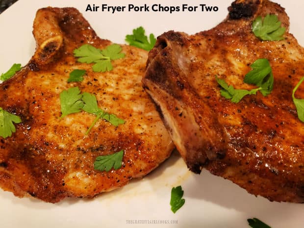 Make Air Fryer Pork Chops For Two! This quick, easy recipe yields delicious, spice-rubbed, bone-in pork chops for two people in 20 minutes.