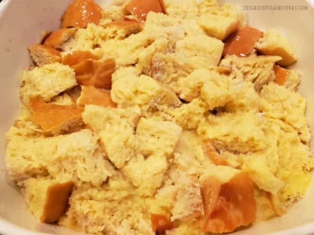 French bread cubes, covered with eggnog mixture is tightly covered and refrigerated overnight..