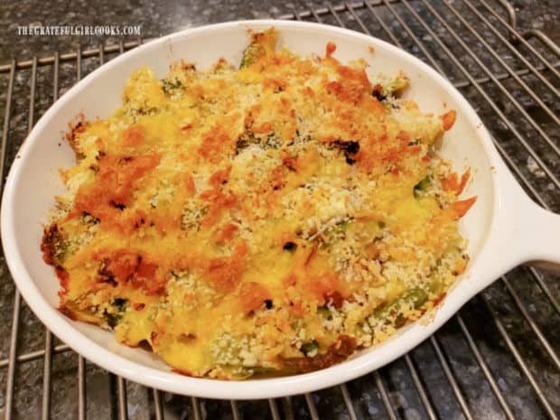 Brussel Sprout Casserole For Two cools on a wire rack after being removed from oven.